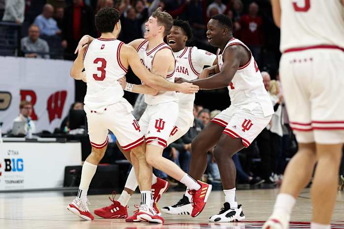 Indiana Hoosiers celebrate a win over the Penn State Nittany Lions at Target Center.